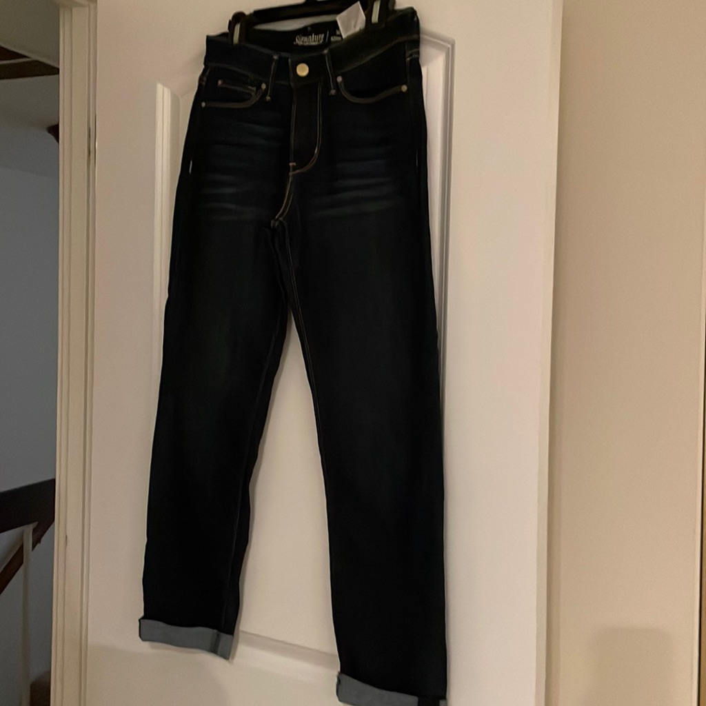 Women’s Slim Cut Levi Strauss Jeans With Cuffed Legs.